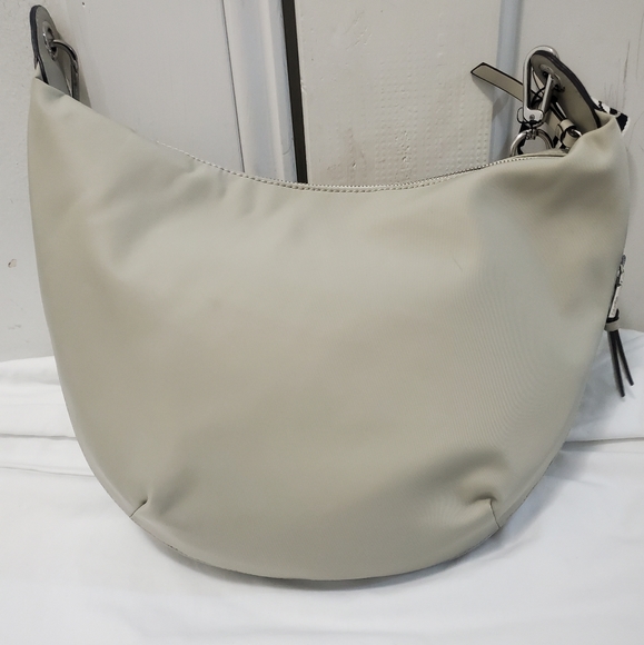 Calvin Klein Saddie Large Crossbody - Picture 3 of 10